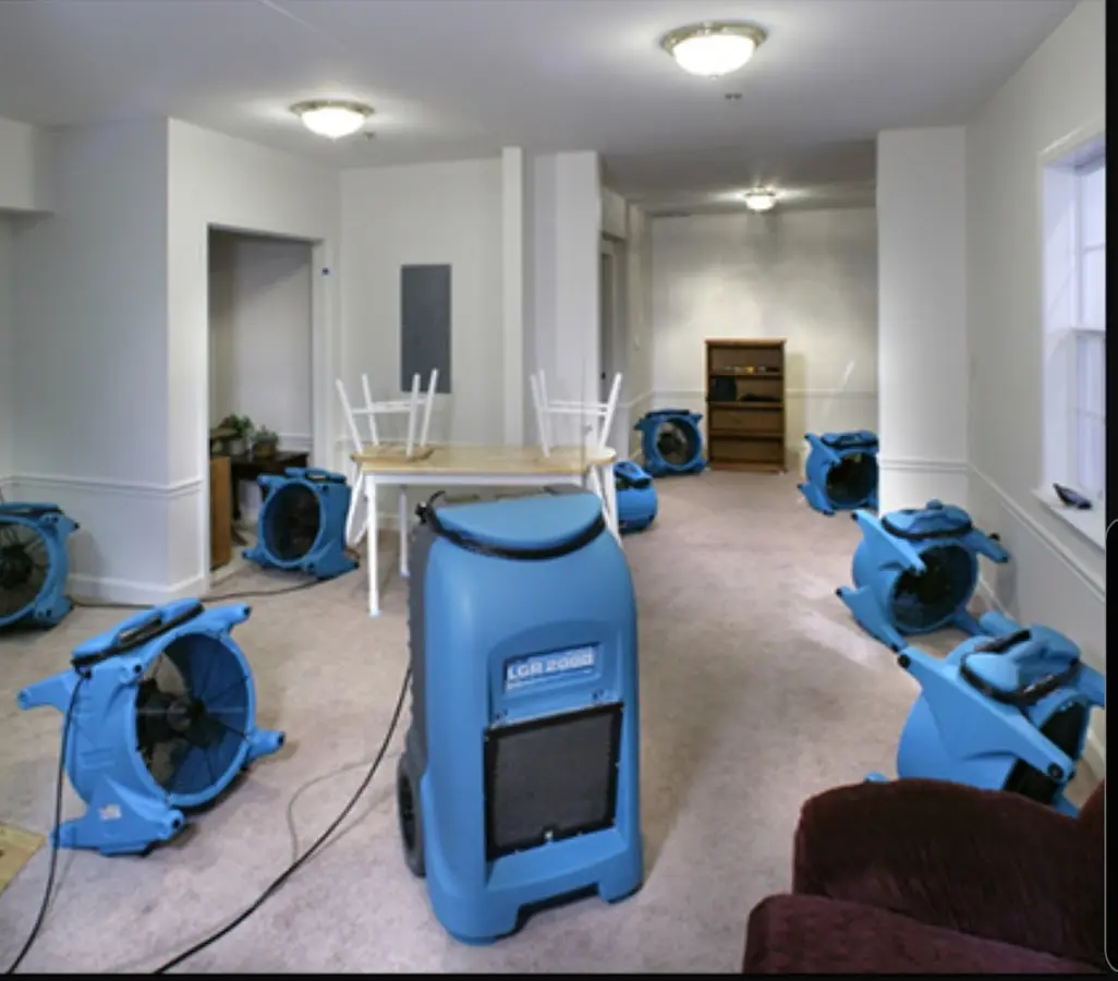 Air movers and dehumidifier setup for Water Extraction & Removal in Perry
